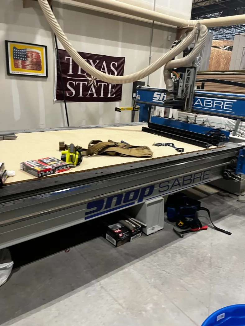 A computer-controlled cutting table in the plant