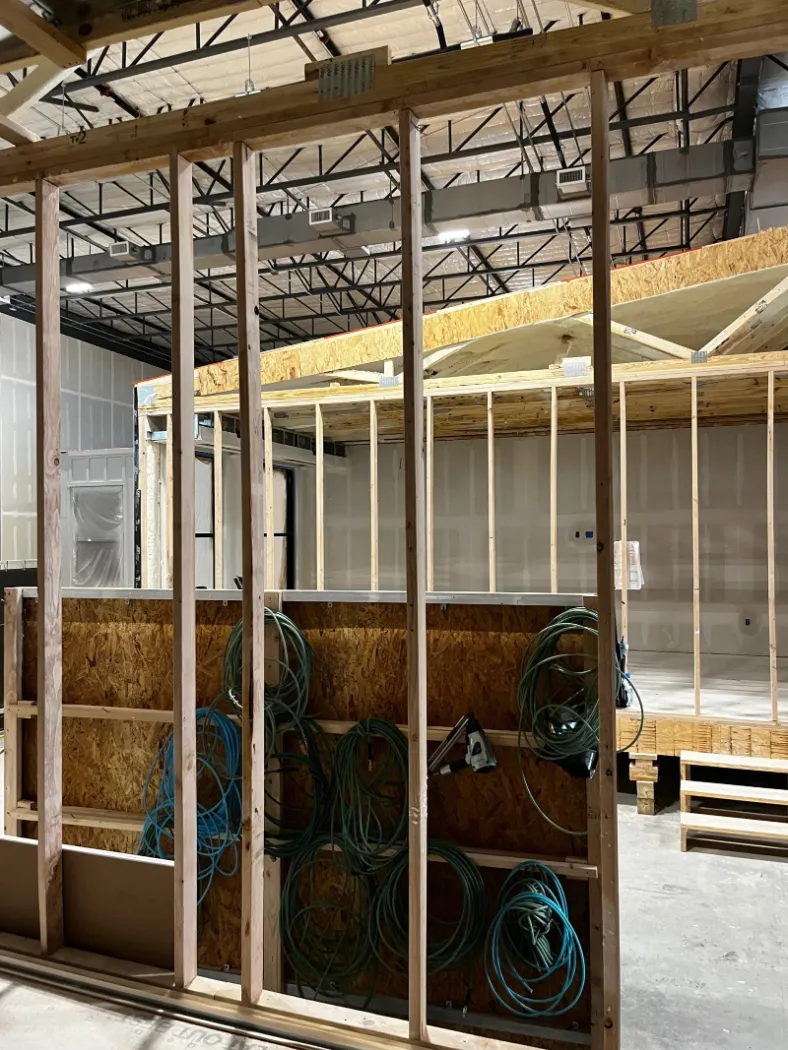 Module wall framing with sheathing in progress