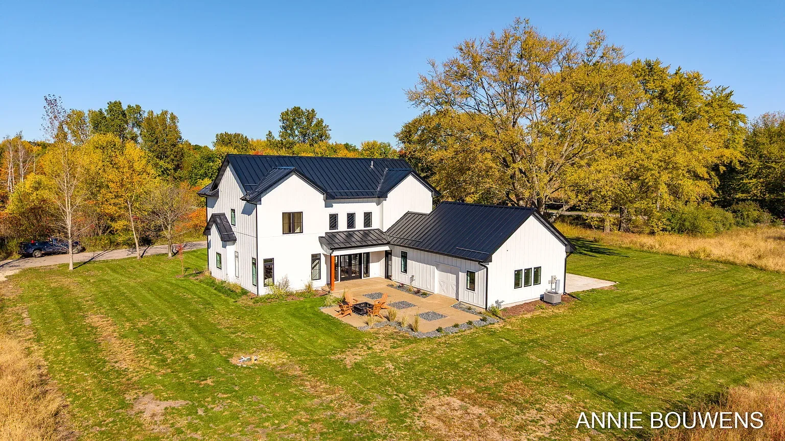 Aerial view of the home and backyard patio