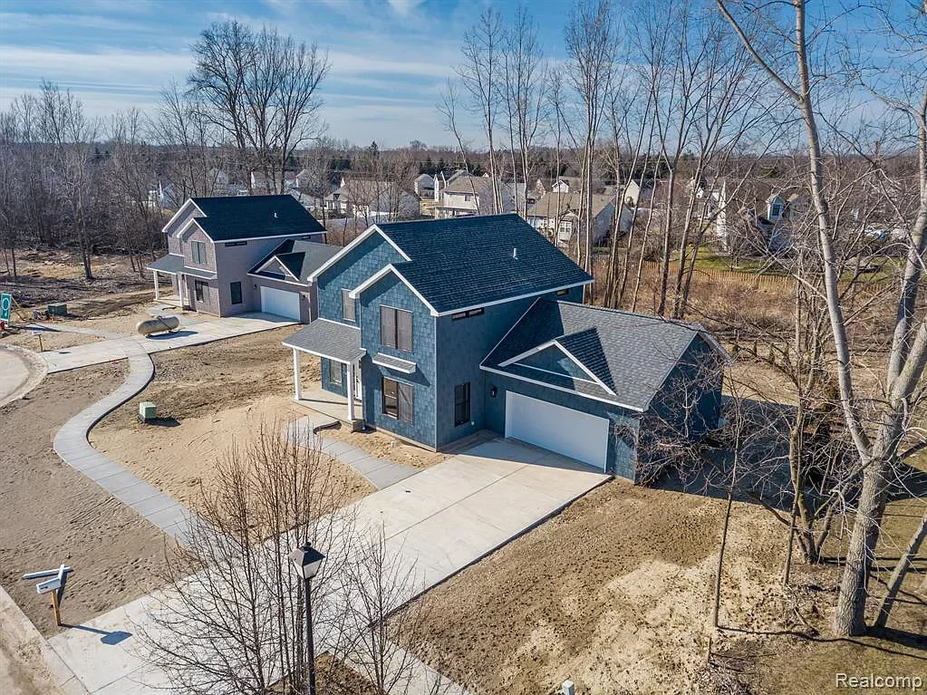 Aerial view of the two finished homes