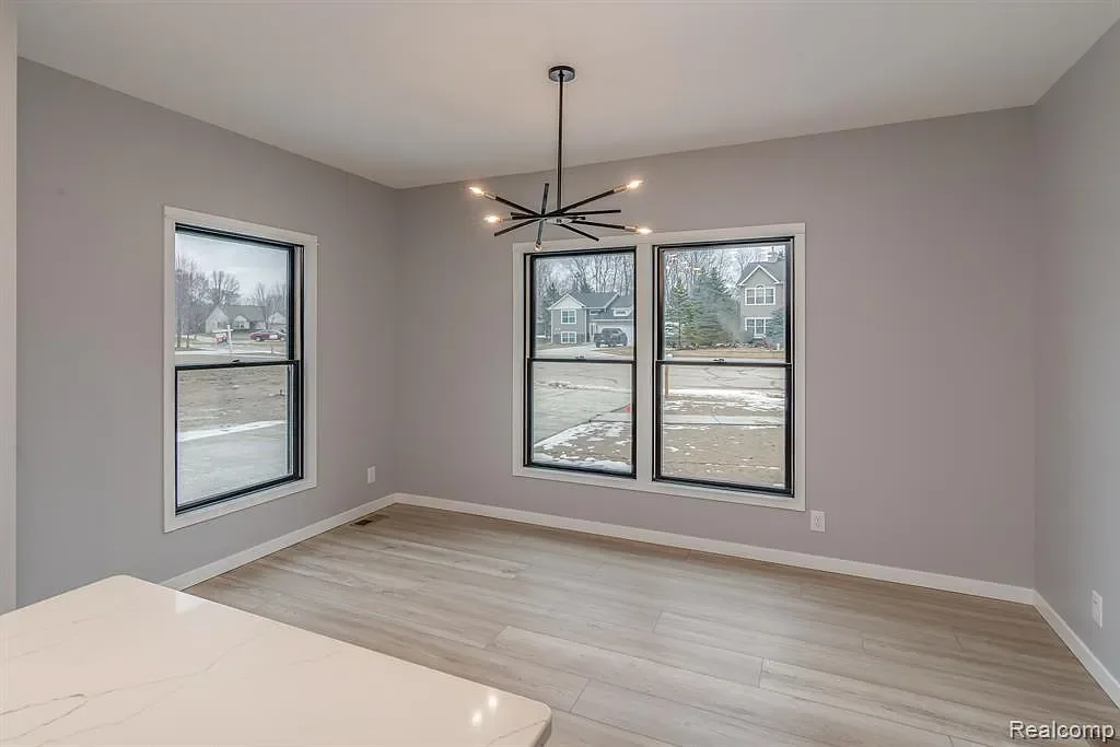 Dining area with a modern light fixture
